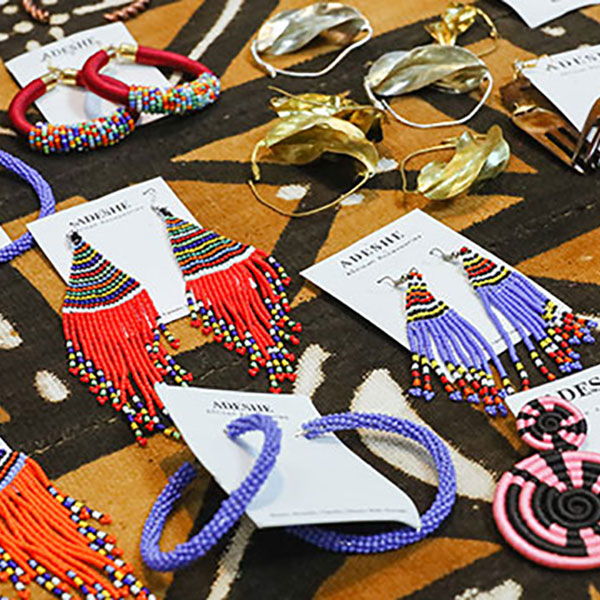 Beaded jewelry on display on a table.